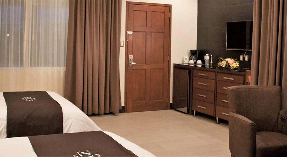 Hotel Ecce Inn&Spa Silao Exterior foto A typical room at the hotel